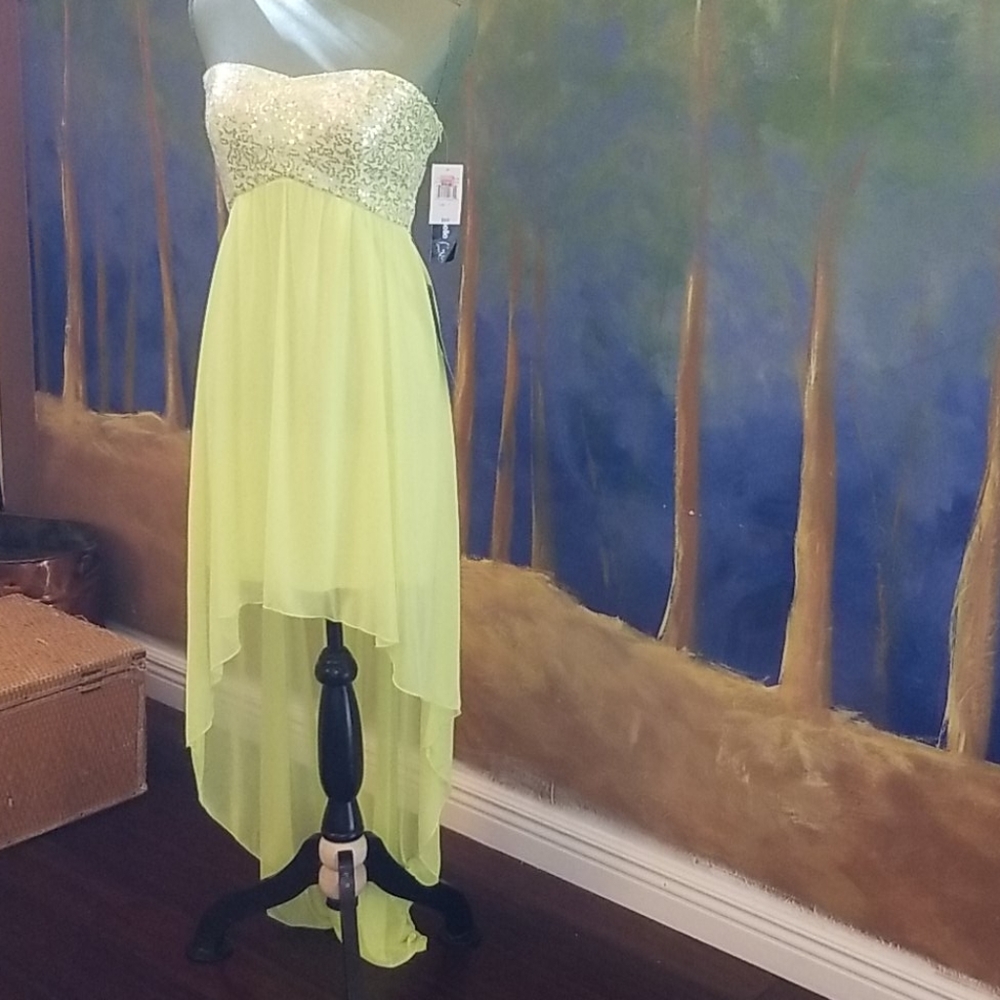 Yellow sequined asymmetrical strapless prom gown